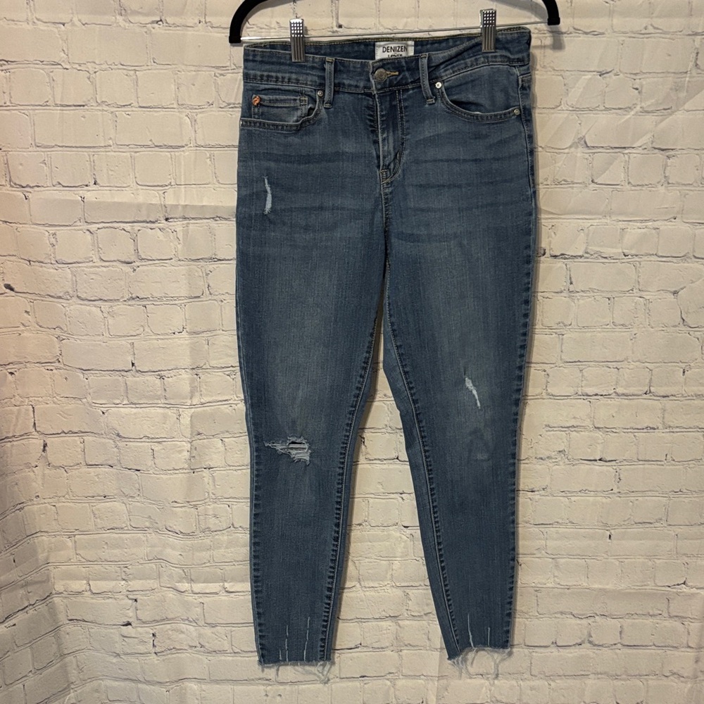 Denizen from Levi's Faded Blue Skinny Jeans with Subtle Distressing